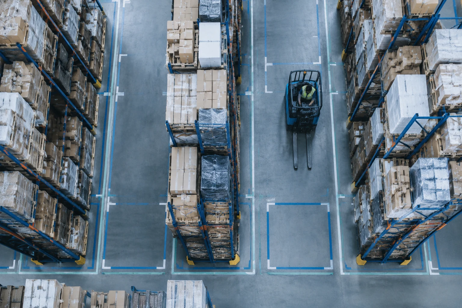 Overhead view of a zoned warehouse floor